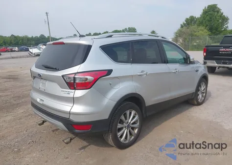 2017 Ford Escape Titanium z USA, uszkodzony, nr VIN 1FMCU9JD7HUB87034